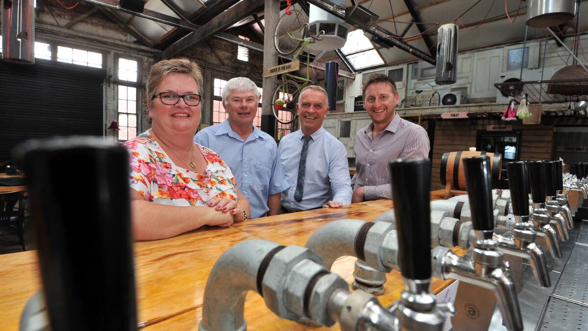 Thirsty: Federation University's Geraldine Lewis, Peter Aldred and Sam Henson along with Australian Craft Beer Centre of Excellence director Brian Taylor.  Picture: Lachlan Bence. 
