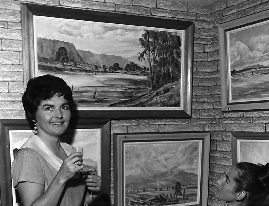 New gallery: Mrs Eve Dulhunty and Mrs Liega Peake at the exhibition of paintings by Les Graham at the opening of the Atelier Gallery in Port Macquarie, 1967.