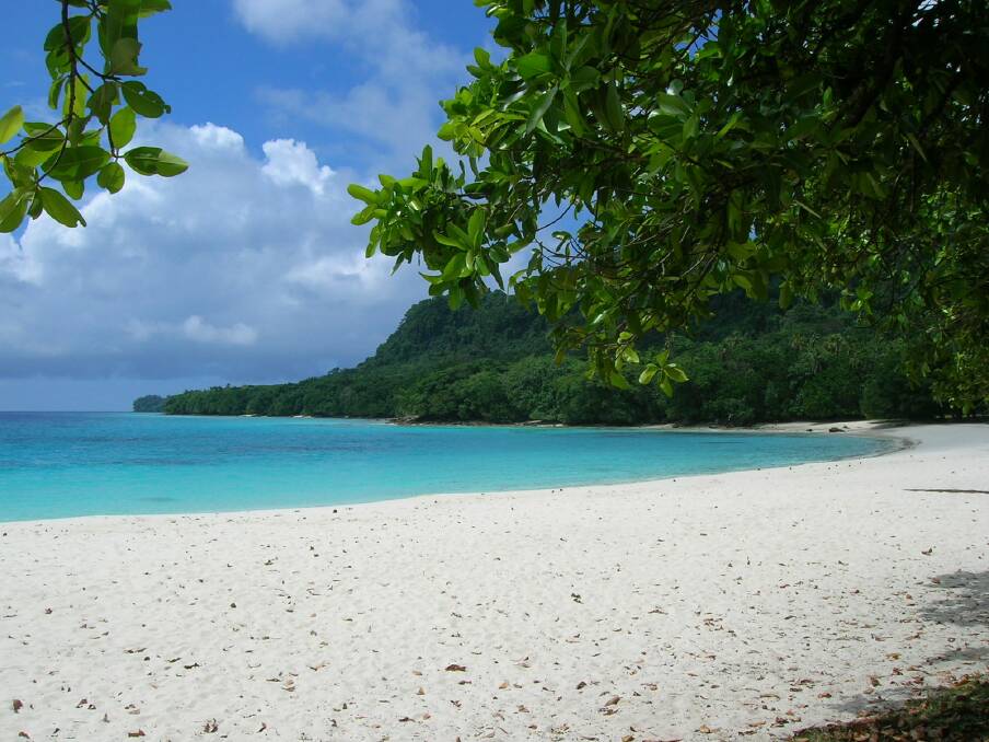 Tropical paradise: The sand feels like talcum powder between your toes on Champagne Bay, Vanuatu.