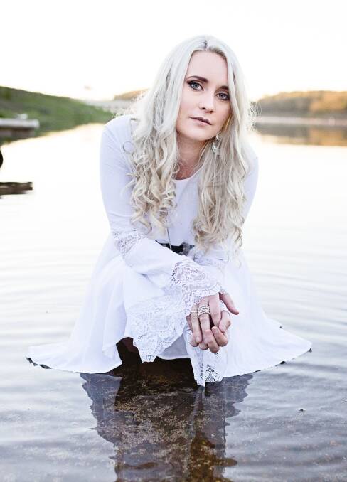 A journey: Former Port Macquarie singer songwriter Aleyce Simmonds launches her third studio album at the Tamworth Country Music Festival.