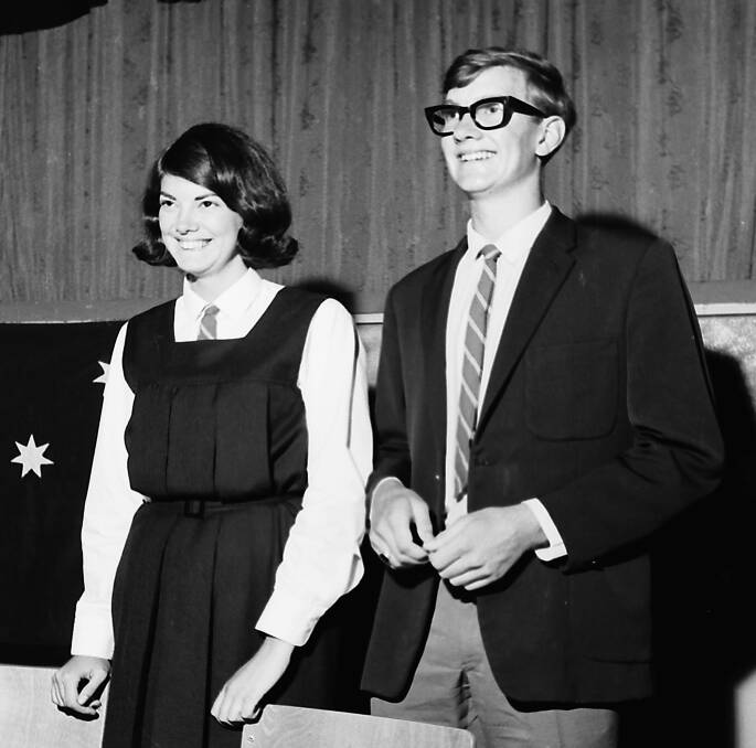 Role models: Port Macquarie High School captains for 1968, Donna Moore and Don Beattie were presented with their badges by primary school principal N.R. Payne. 