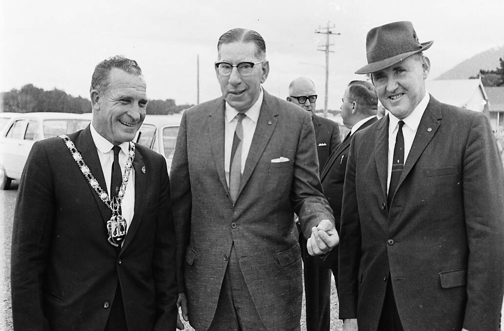 Official party: Cr J. Andrews, shire president; Mr J. Shaw, Commissioner for Main Roads, and Mr Bruce Cowan, MLA for Oxley, at the opening of the sealed coast road section officially named Ocean Drive, 1966.
