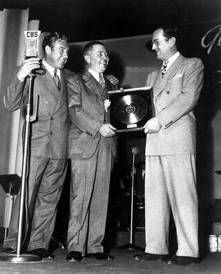All aboard: The one grainy photograph of Glenn Miller receiving the first gold record in history for his single Chattanooga Choo Choo.