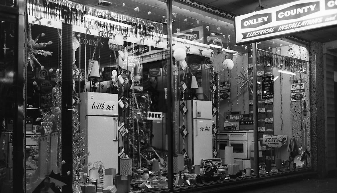 Festive cheer: Christmas Decorations in Oxley County Council store window on Horton Street, circa 1960s.
