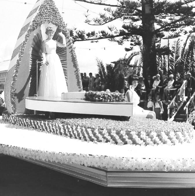 Flower power: The winning queen float for the 1967 Carnival of the Pines was the motels-hotels float which featured 50,000 flowers. 