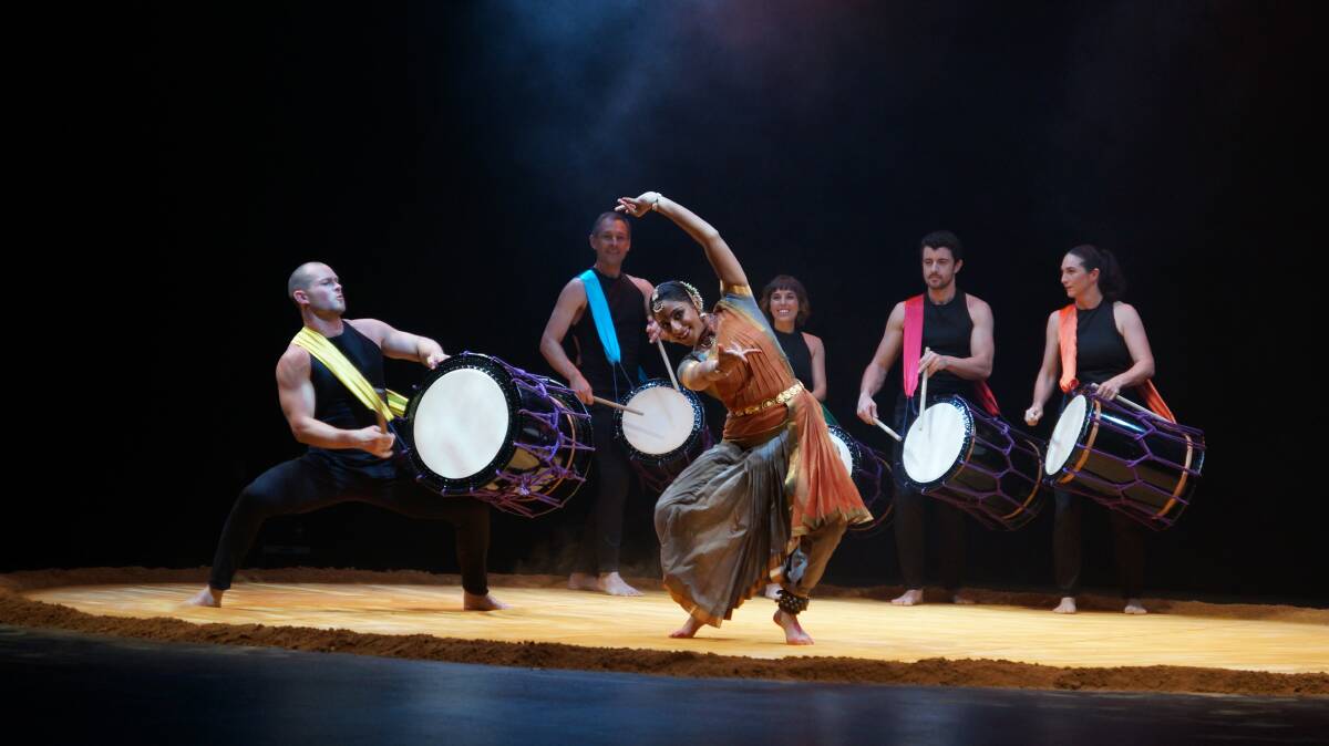 Joyous: Former Kendall resident Anton Lock and the Taikoz drummers perform Chi Udaka with Langalayam Indian dance company at the Glasshouse on July 29.