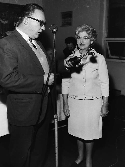 Good catch: Mrs Ashford, the Angling Club’s women's champion receives her award from the deputy mayor, Ald Gott at the Angling Club presentation night, 1967.