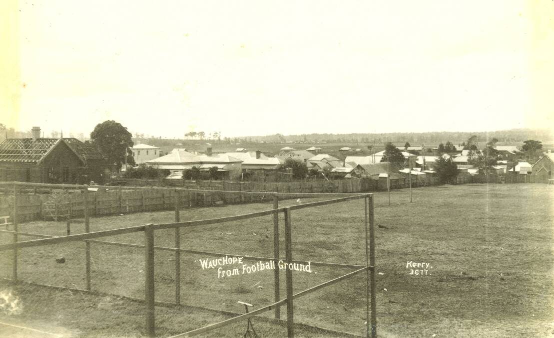 A growing town: Wauchope looking from the tennis court in foreground across the football ground, c1905.