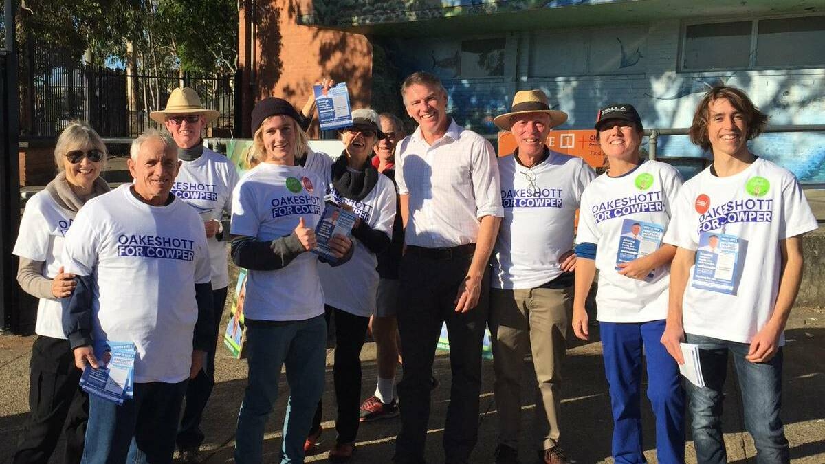 Cowper candidate Rob Oakeshott with supporters on the Coffs coast on Saturday morning.