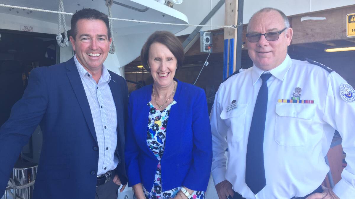 HAPPY DAYS: Minister Paul Toole, Port Macquarie MP Leslie Williams and Marine Rescue unit commander Greg Davis at the annoucement this week. Photo: Laura Telford.