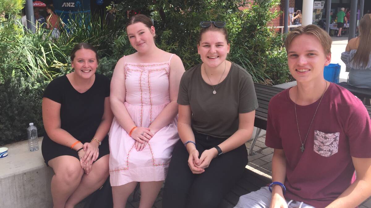 HAPPY: Claire Brennan, Maddison Stone-Meere, Elissa Walker and Zac Pope on campus.