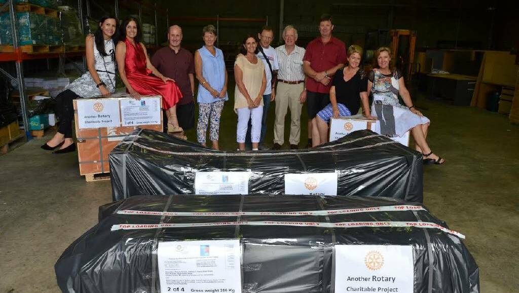 A GREENHOUSE TO NEPAL: Janine Buesnel, Ruth and Ian Nettle, Jo Roh, Kerrie Wood, Dr David Malikoff, Neil Black, Geoff Denyer, Joy Raisborough and Trish Afleck-Mooney, pictured with greenhouse parcels, prepared for the project in Kharikhola.