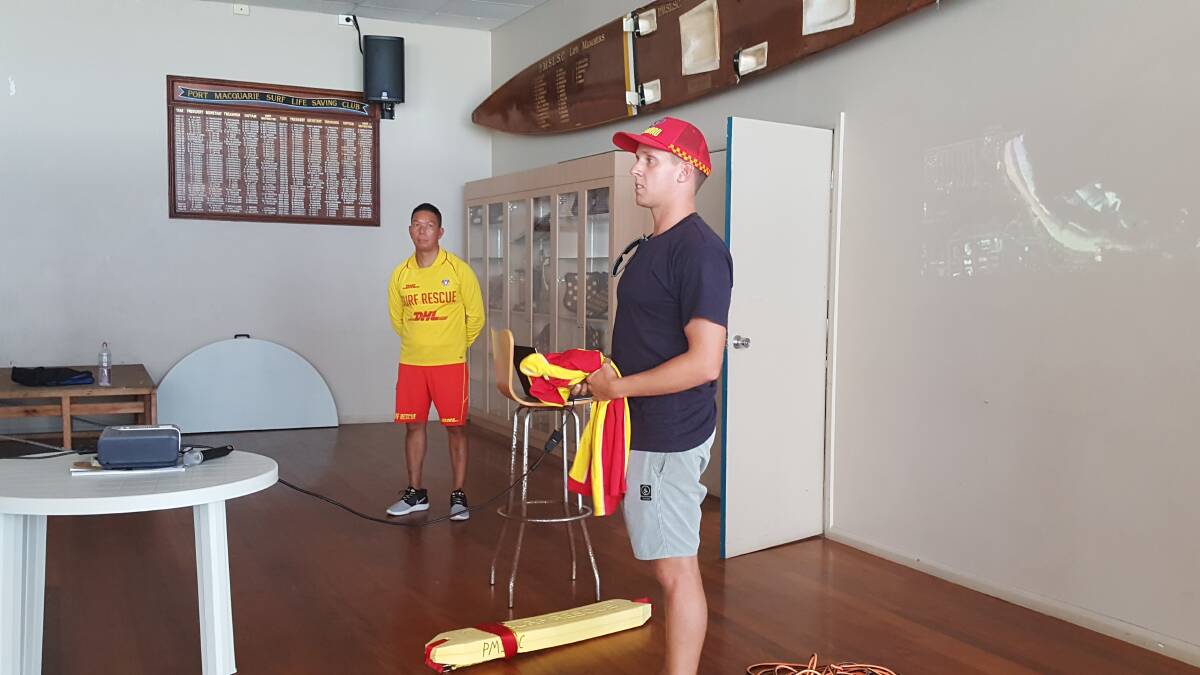 Head lifeguard James Turnham explaining the most common tool lifeguards and lifesavers use to pull people from the water.