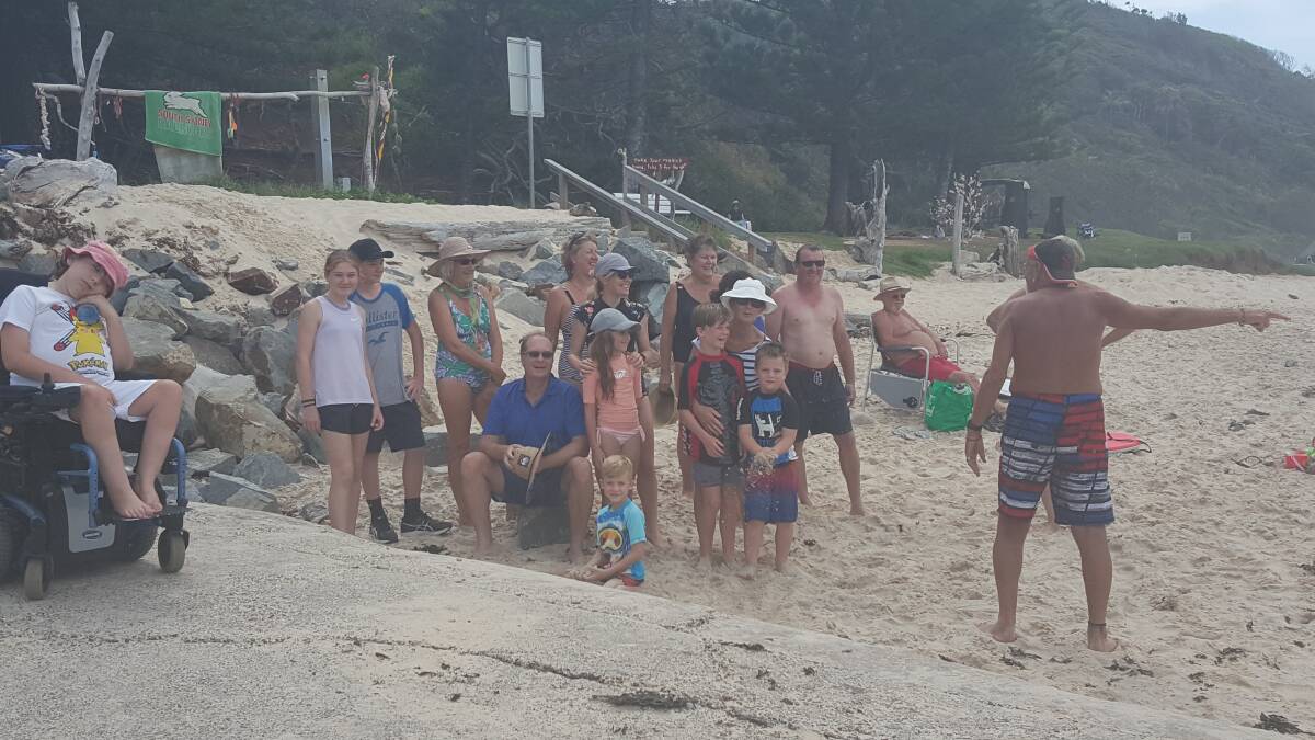 SWIM BETWEEN THE FLAGS: Holiday makers and locals come together at Shelly Beach to share in the local knowledge of an unpatrolled beach. 