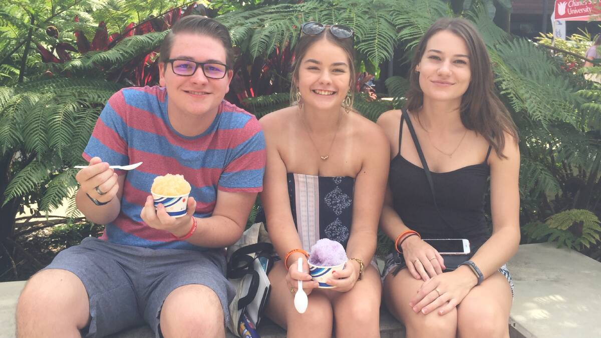 FRIENDS: Jackson Starr, Brooke Hanson and Carly Gander enjoy ice treats on campus.