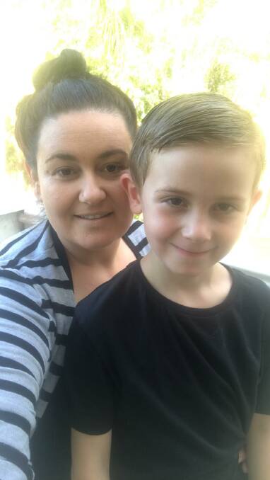Concerned: Josie Sutherland and her son Harper who was bitten by a dog at a park in Port Macquarie.