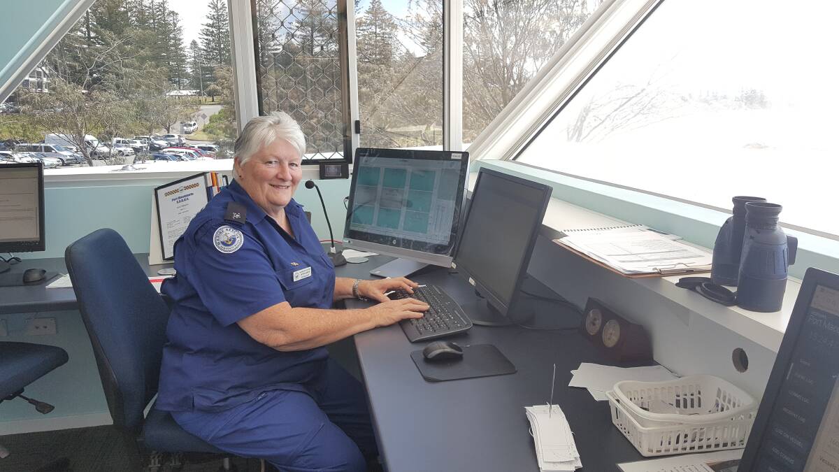 GREAT JOB: Patricia White at her desk in the radio base at Town Beach. Photo: Laura Telford.