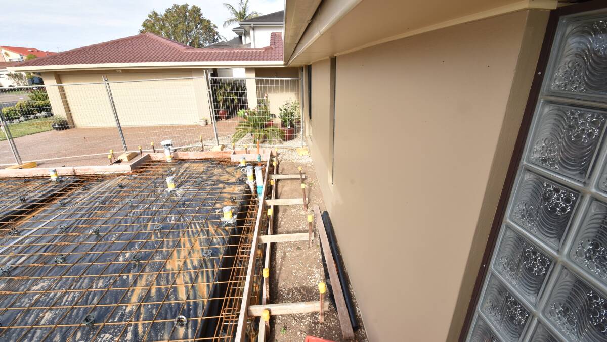 Dwelling construction: Residents Peter and Sharon Cordell are concerned about a development taking place close to their property. They said they will no longer be able to service the side of their house.