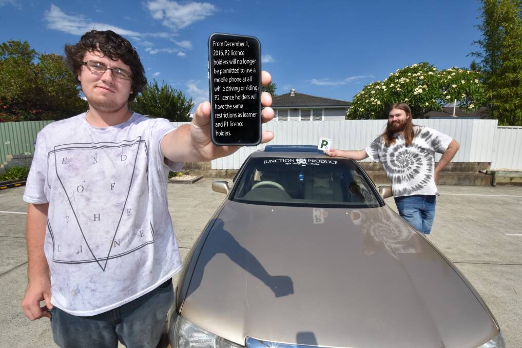 Mobiles prohibited: Green P-plate drivers Blake Fiene and Joseph Walsh say they are now a target due to the introduced law. 
