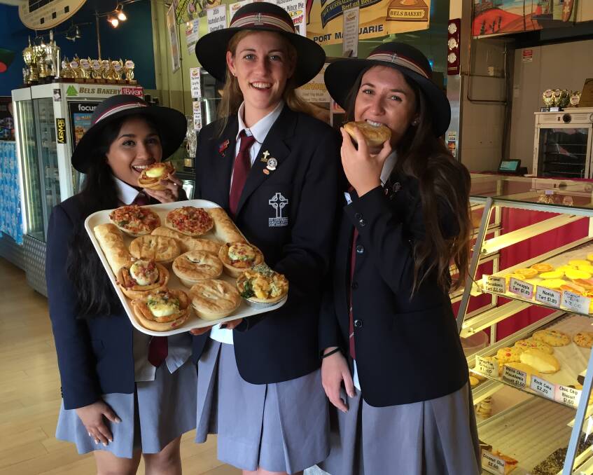 All smiles: The pastries are a big hit for St Columba Anglican School year 12 graduates Hanna Cabanero, Abby Morrison and Emily Supple.  