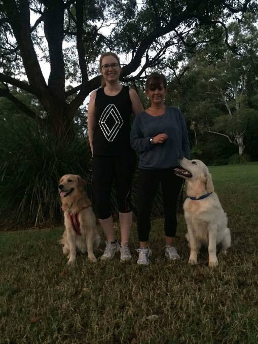 Call to action: Port Macquarie resident and owner of Jimmy the Golden Retriever Kate McKinnon with Lea Jones and dog Nelson. The women want to be able to freely exercise their dogs without a leash at a park. 
