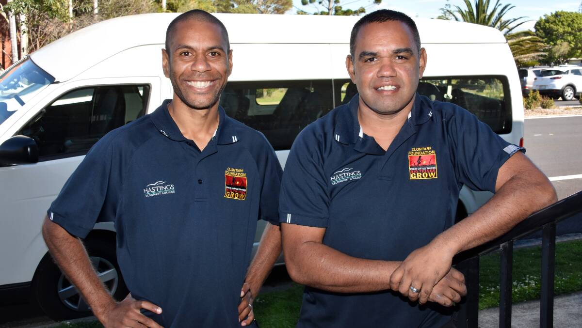Role models: Clontarf Foundation director Charlie Maher and operations officer Vincent Scott work with indigenous students at the Hastings Secondary College Port Macquarie. 