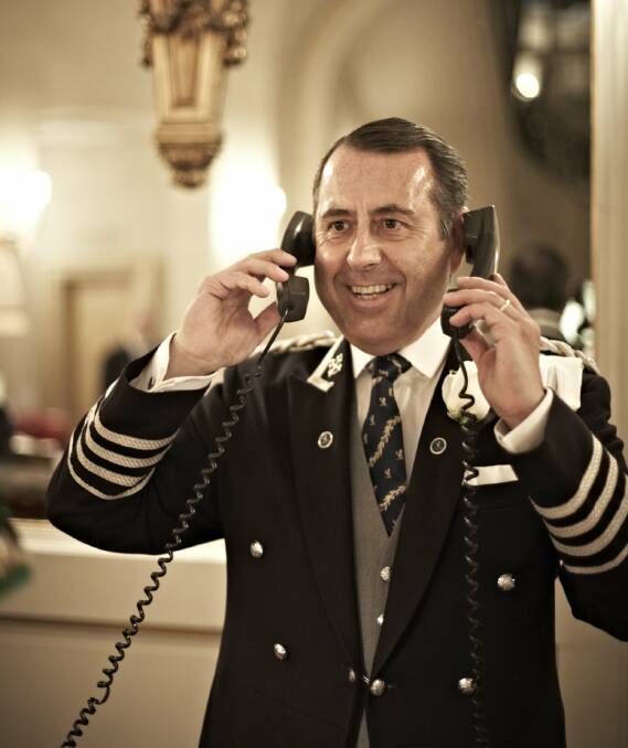 MAN OF ACTION: Michael De Cozar, concierge at London’s The Ritz Hotel, forever obliges with guest requests, even when asked to fill a tub with seawater from Brighton Beach or to locate and buy a battleship.