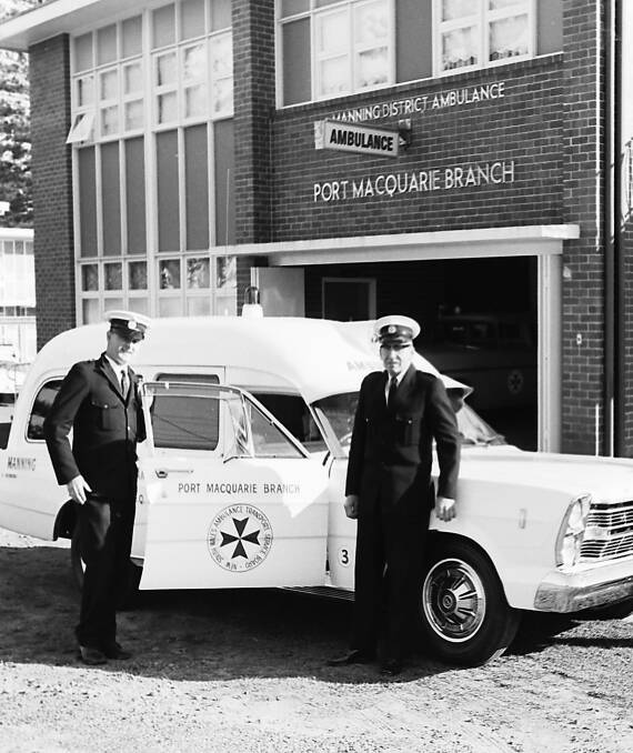 Merv McCudden and Neville Stanton with the new ambulance at the Ambulance Station in Clarence Street, 1967. The new vehicle is a Ford Galaxie.