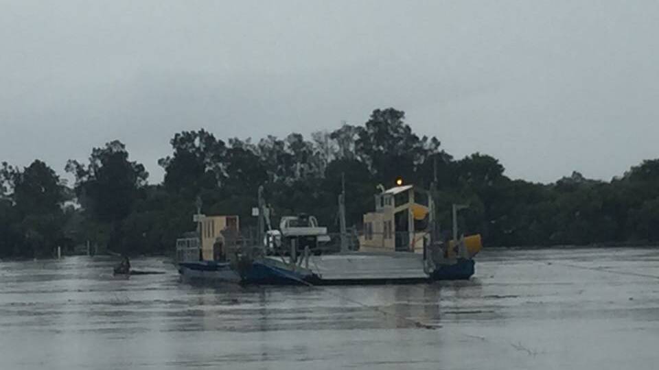 Hibbard Ferry navigates debris in the Hastings River. Photo: Peter Daniels.