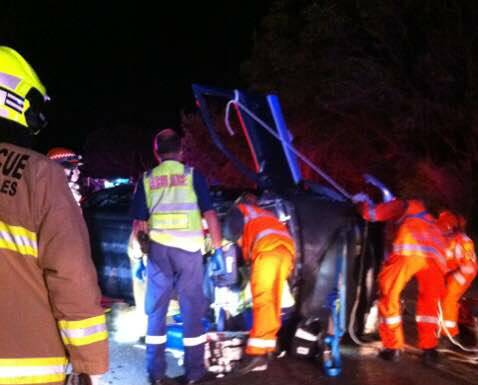 Emergency services attend to a multi-vehicle accident on Pacific Drive on Friday night.