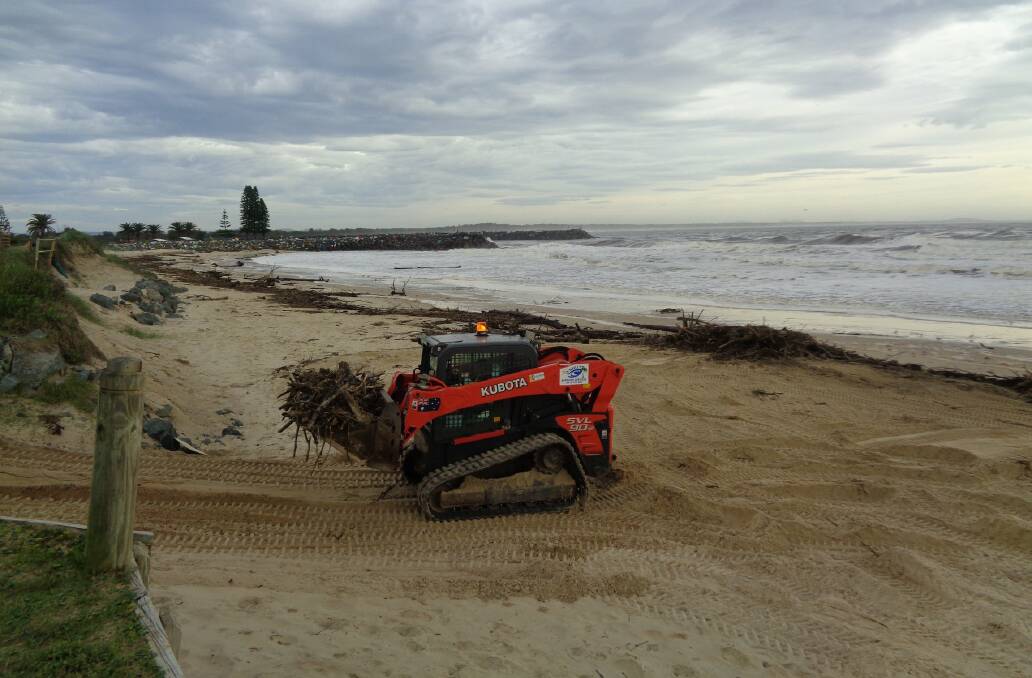 Clean up begins: Council commences the post-storm clean up on Town, Oxley and Flynns Beach. Photo: PMHC