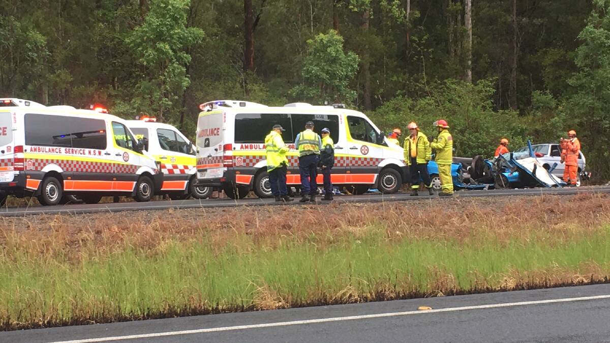 Emergency services at the scene of an accident on the Pacific Highway south of Port Macquarie.