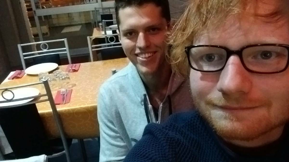 Star struck: Ed Sheeran with one lucky diner, Paul Wilberforce, at Laurieton's Bollywood restaurant in 2016 during an impromptu stop-over.