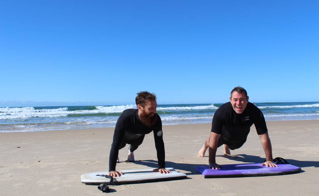 Accepting the challenge: Shane Roche and Dale Carr have taken on the push-up challenge to raise awareness about post traumatic stress disorder. 