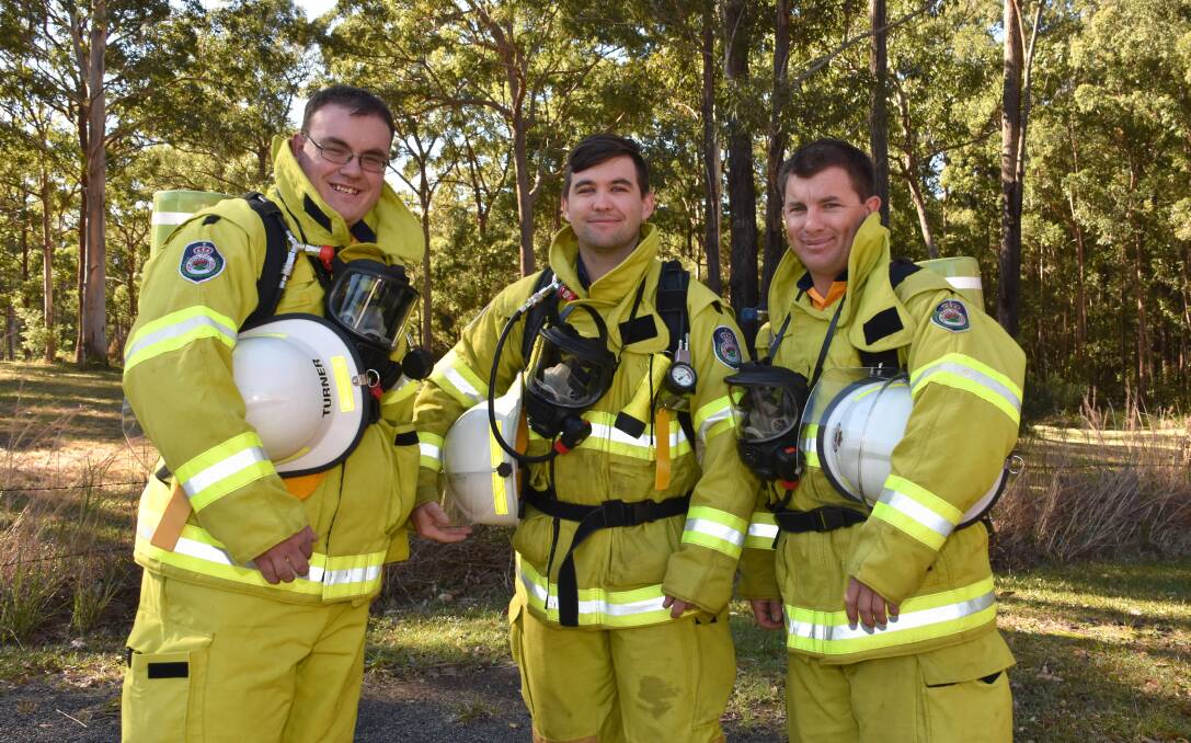 Challenge: Firefighters James Turner, Aaron Hall and Micah Hanson are ready to take on the Sydney Tower climb for MND. Photo: Ivan Sajko