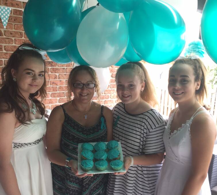 Showing their support: Steffani, Rosie, Abbey and Mackenzie Adams hosted an Afternoon Teal in memory of Rosie's grandmother and to raise awareness about ovarian cancer.