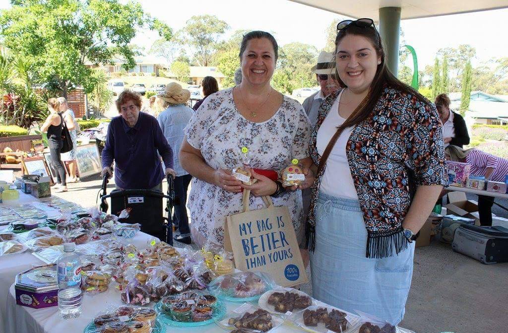 Denise Smith and Sarah Smith donating baked goods.