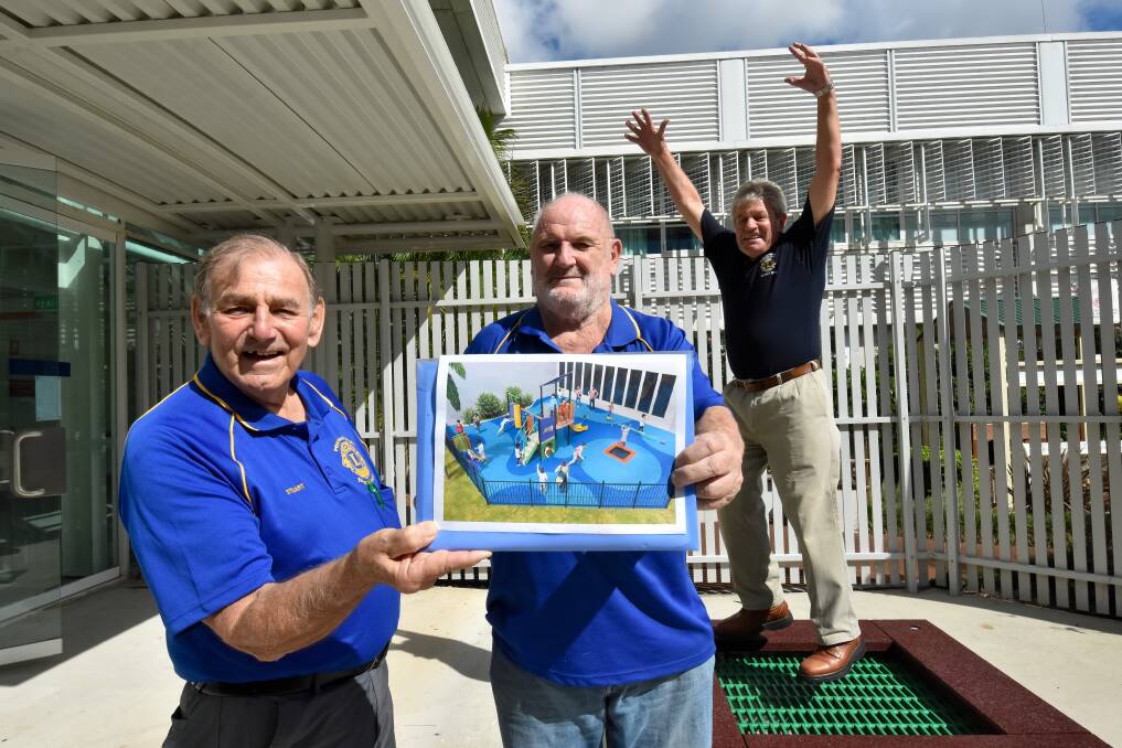 Jumping for joy: Stuart Aston, Malcolm Merrick and Rob Bruce of Tacking Point Lions Club with the courtyard plans. 