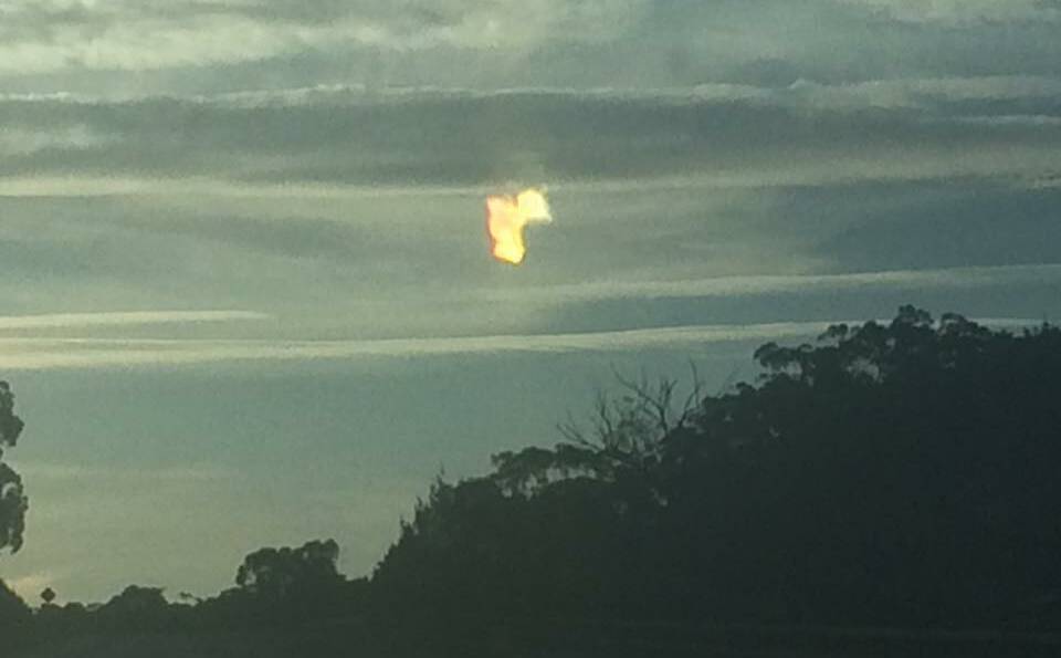 Strange light formation in the early evening sky captured over Goulburn by a Port Macquarie resident last week. Photo: Facebook