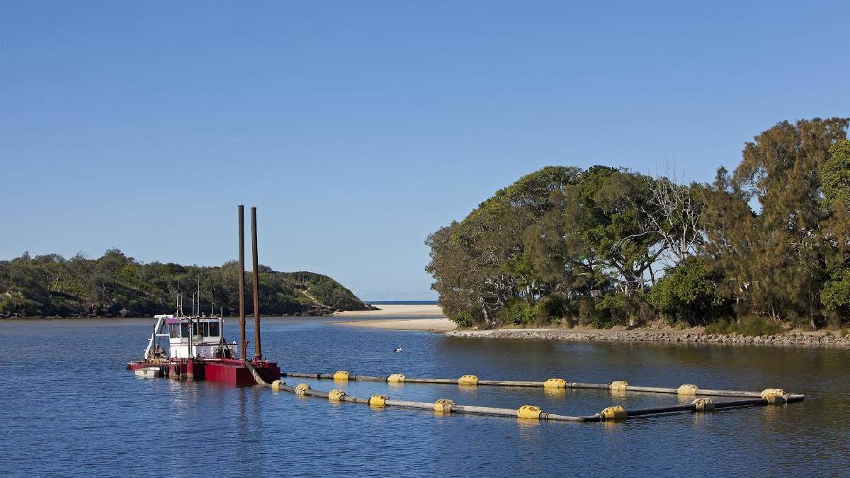 Previous dredging works being carried out on Lake Cathie.