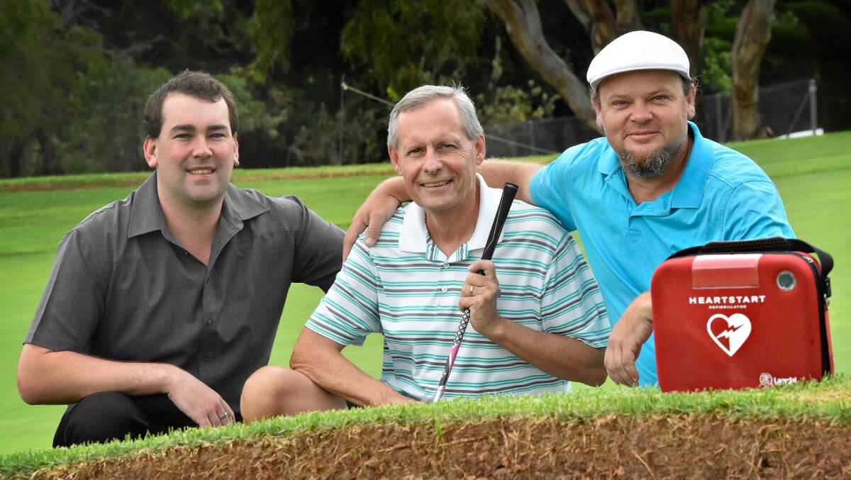 Defibs save lives: Tony Hayward (centre) thanks Port Macquarie Golf Club duty manager Tim Harris and golf club member Dean Hepburn. Photo: Ivan Sajko