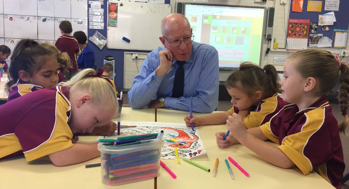 High level visit: NSW Governor David Hurley talks to Westport Public School students Sophia Austin, Tamika Clarke-Dickson, Daena Barnett and Sienna Peckham-Jones.