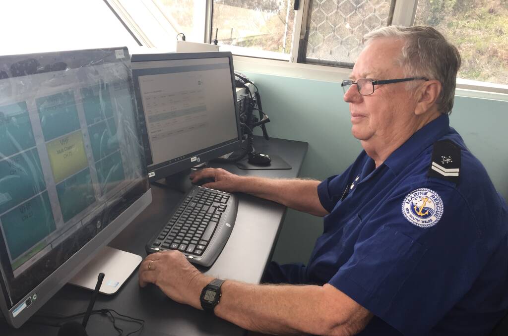 Improved facility: Marine Rescue Port Macquarie volunteer John Pickett on duty at the upgraded radio base.