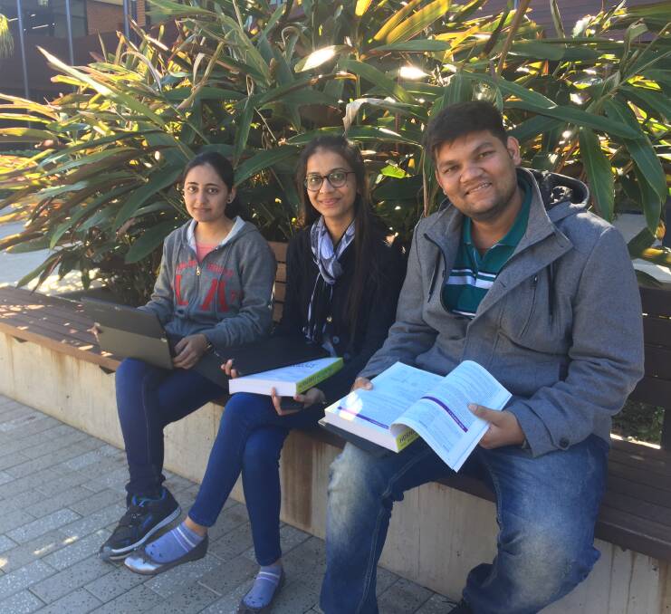 Aussie experience: International students Tanvi Vahora, Neha Patel and Anurag Kharva have recently arrived at Charles Sturt University Port Macquarie Campus.
