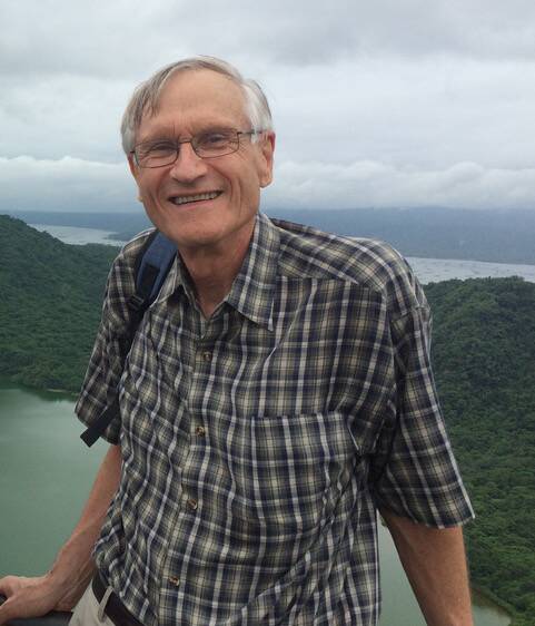 Stellar career: Emeritus Professor Michael Barber during a visit to the Taal Volcano in the Philippines as part of his UN-related work. He was recognised in the Australia Day Honours List.