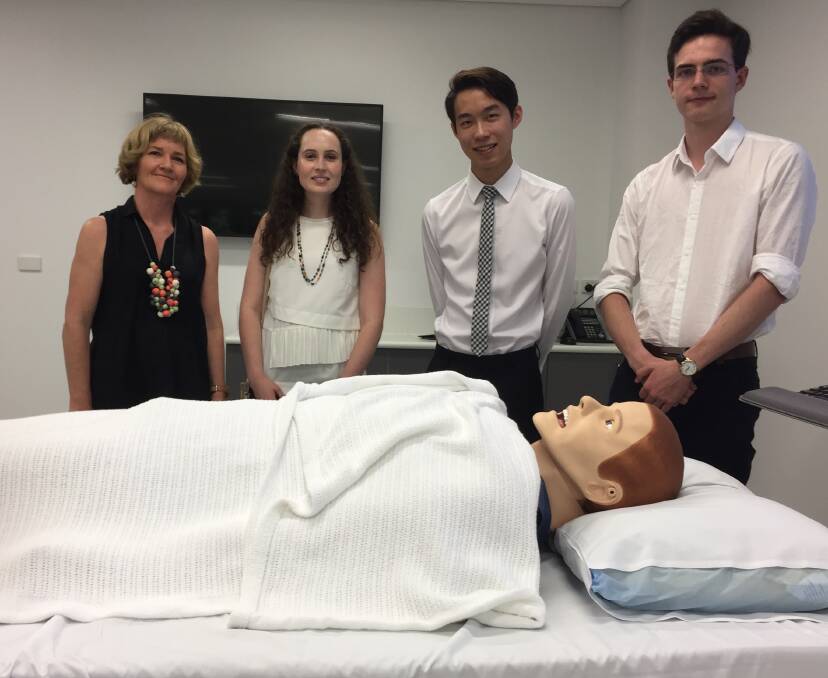 State of the art facility: Port Macquarie Campus phase one coordinator Sue Carroll and UNSW medicine program applicants Natalie Dierick, Thomas Tsang and Callum McTigue pictured with a simulation mannequin.