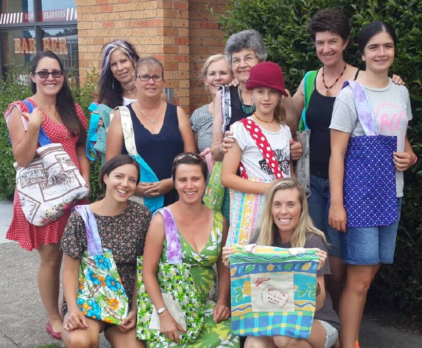 Sustainable approach: (back) Mel Allwood, Heather Frewin, Tracey Bancroft, Wendy Kelly, Judith Grace, Isabel Krige, Julie Krige, Emily Krige, (front) Sabrina Friedrich, Kasia Adamczyk and Shannon Kelly support Boomerang Bags.

