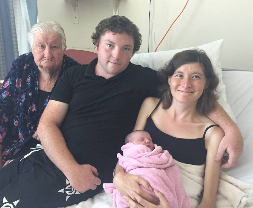 Welcome to the world: New parents Elijah Alexander and Sam Craig-Mullard with their daughter Sophia Rose as great-grandmother Alice Mullard looks on.