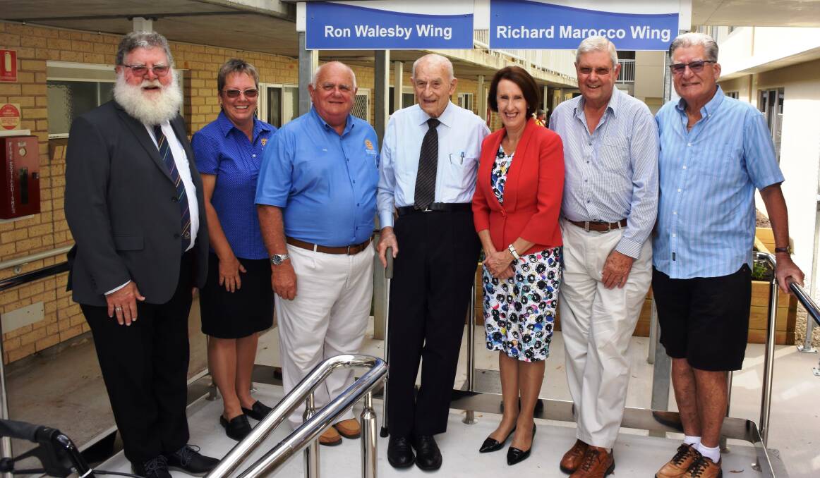 Contribution recognised: Phil Hafey, Paula Johnson, Phil Perry, Ron Walesby, Leslie Williams, Richard Marocco and Phil Brown mark the Rotary Lodge extension opening. 