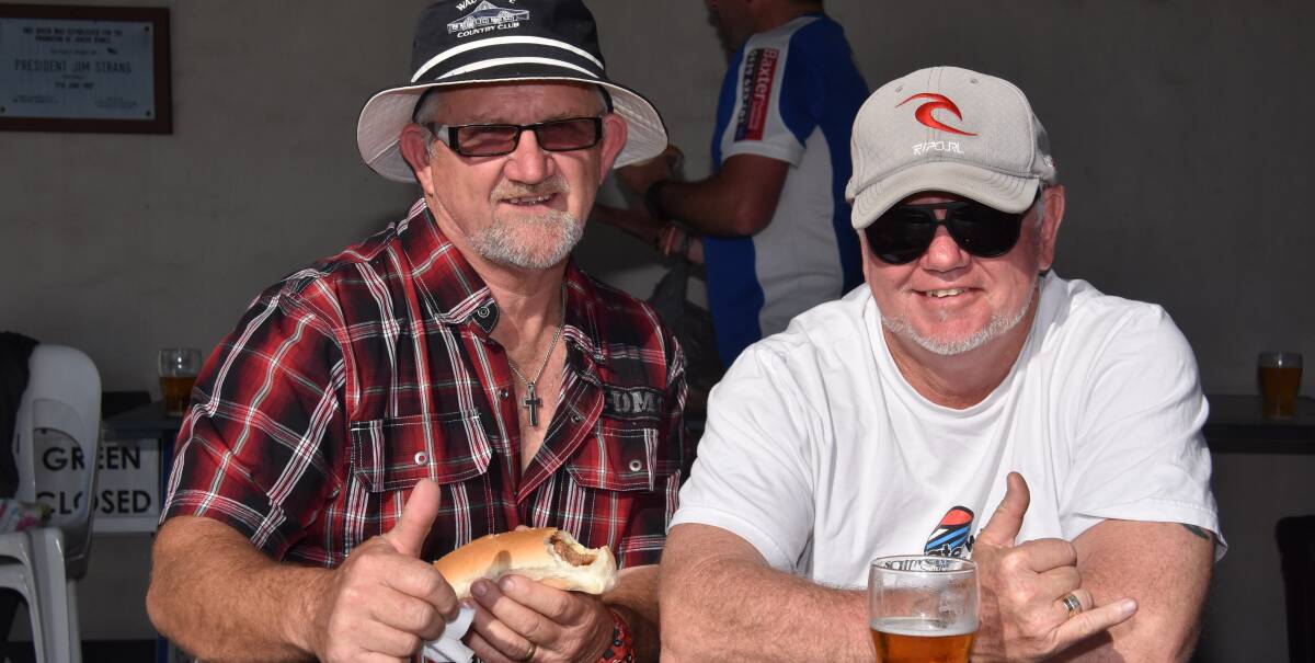 Mark New and Pete Collins reminisce about old times at the Port Macquarie Boardriders reunion. They joined in a bowls afternoon.